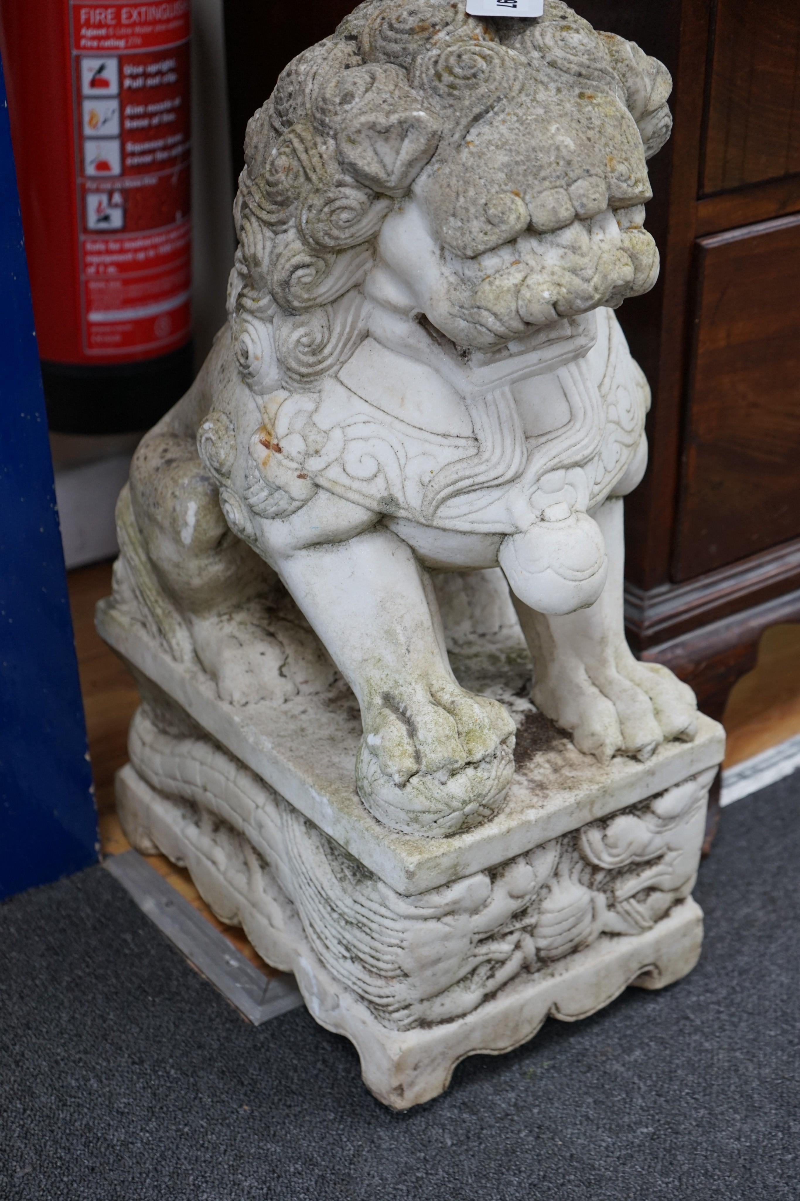 A Chinese carved marble Lion Dog, height 60cm